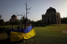 Ukrainians holding the Ukrainian flag in New Dehli